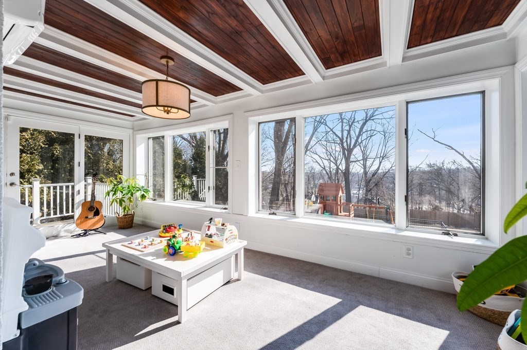 21 Arborough Road Boston, MA 02131 - Photo 6 of 40 a living room with furniture and a large window