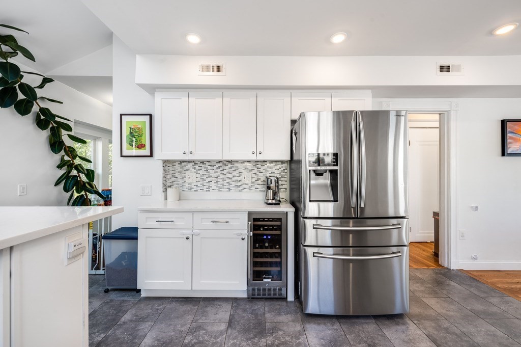 21 Arborough Road Boston, MA 02131 - Photo 8 of 40 a kitchen with a refrigerator and a sink