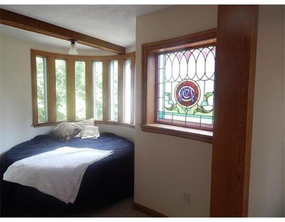 112 Trapelo Road Lincoln, MA 01773 - Photo 13 of 19 a bedroom with a bed and a window