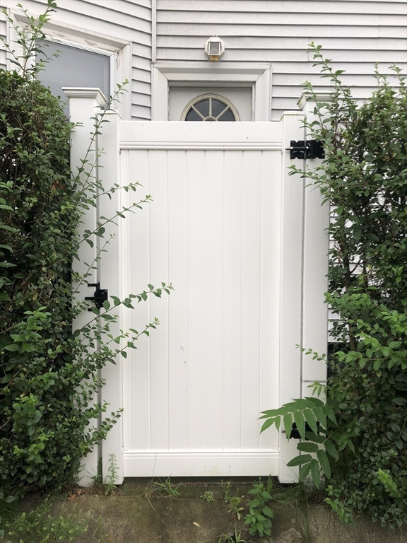 3 Guernsey Street, Unit 3 Boston, MA 02131 - Photo 18 of 23 a view of a house with a yard