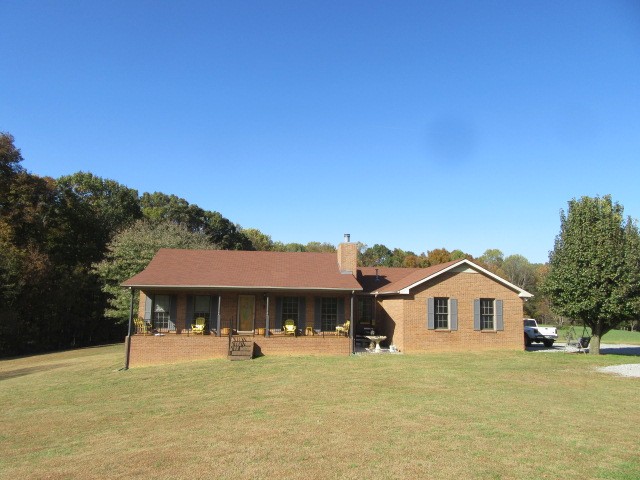 2682 Woods Road Springfield, TN 37172 - Photo 1 of 29 a front view of a house with a garden