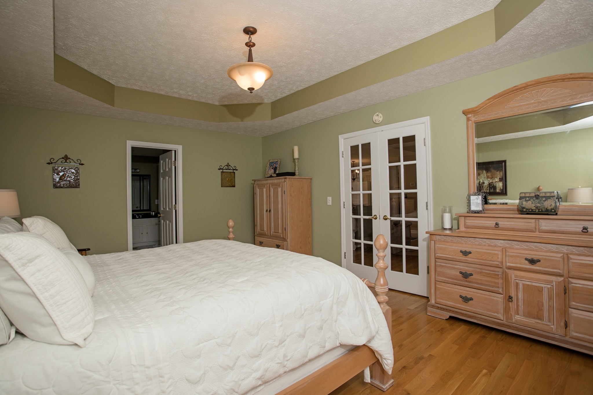 2682 Woods Road Springfield, TN 37172 - Photo 15 of 29 a spacious bedroom with a bed and a dresser