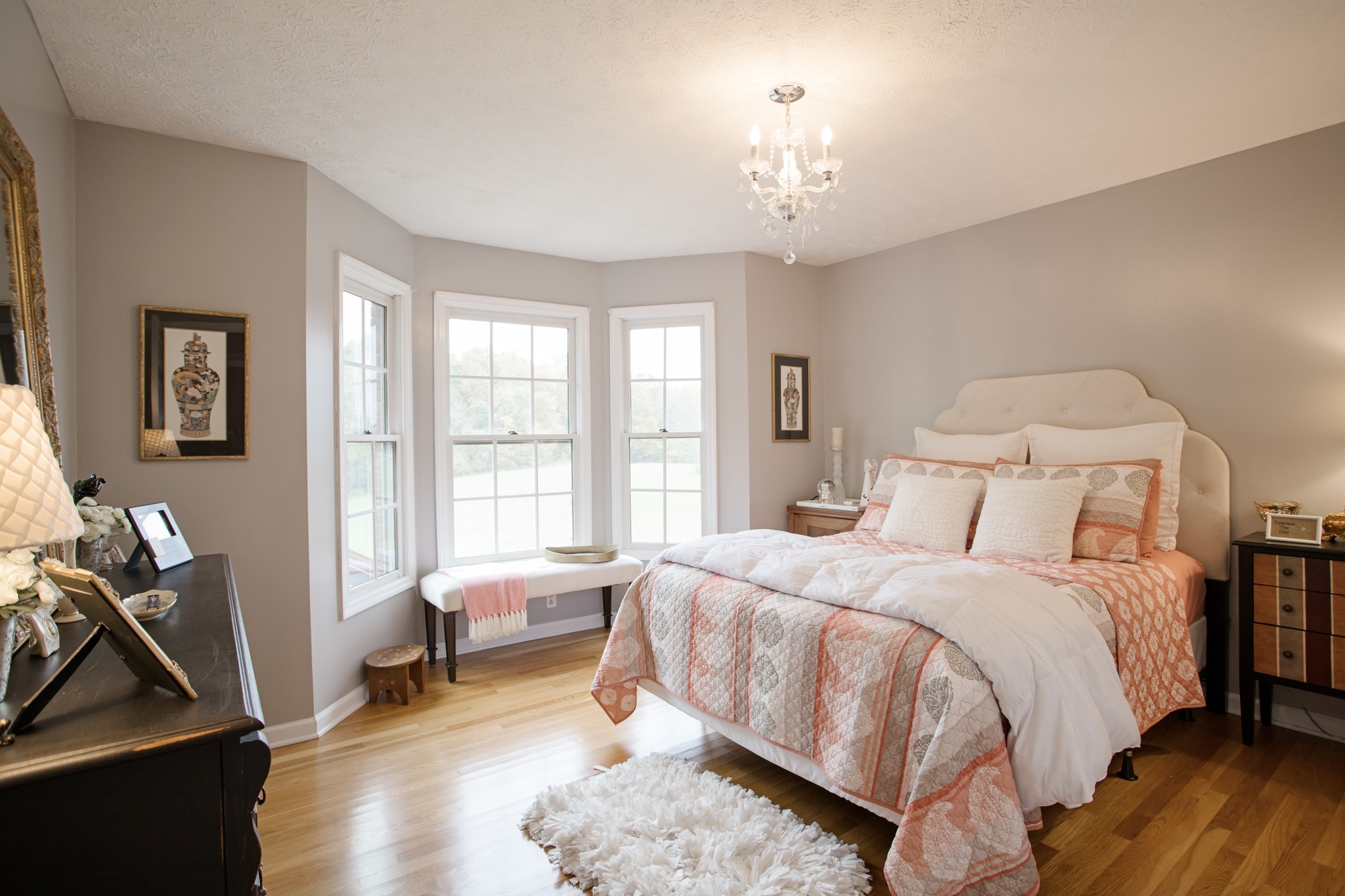 2682 Woods Road Springfield, TN 37172 - Photo 20 of 29 a bedroom with a bed and a chandelier