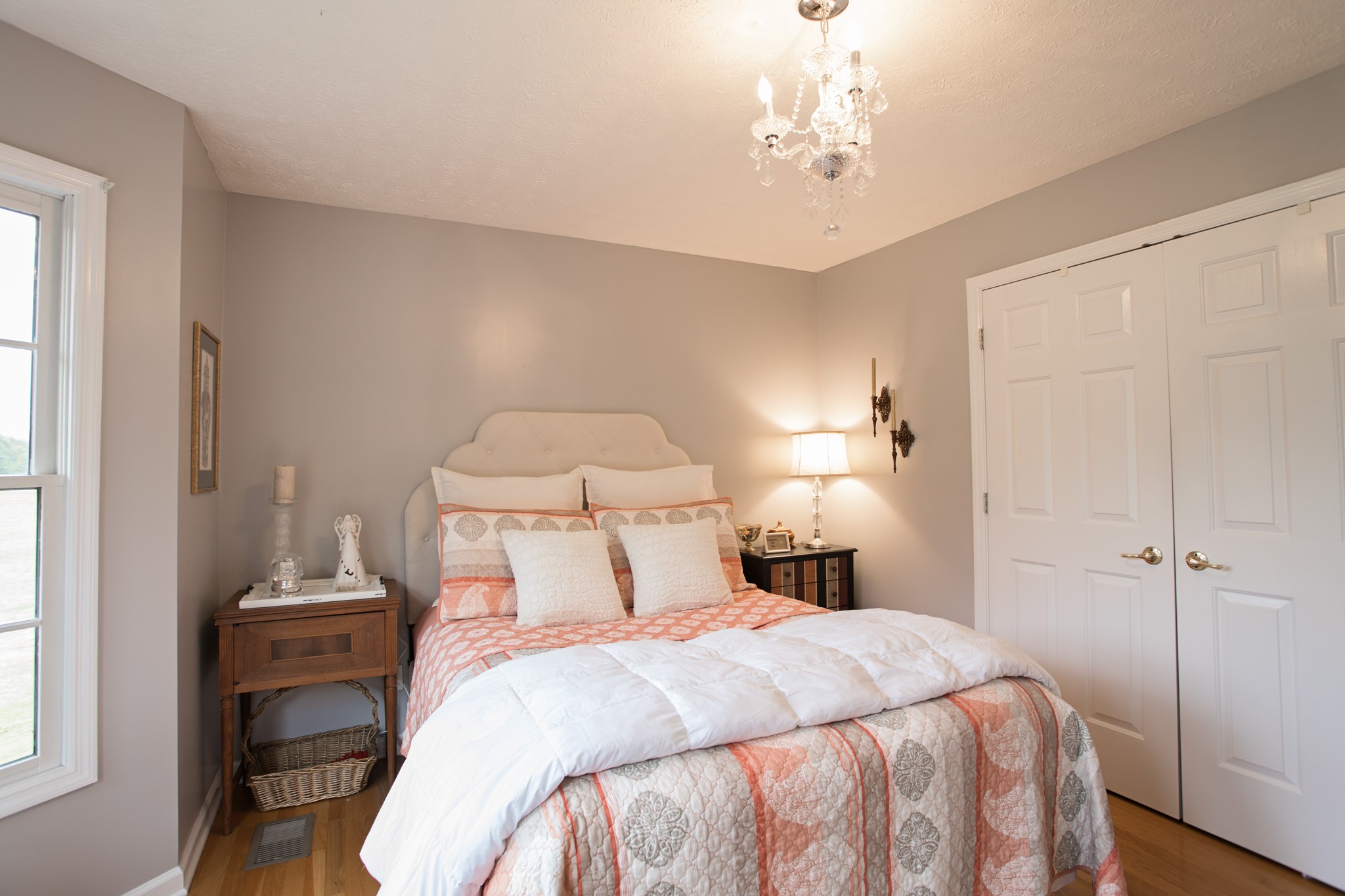 2682 Woods Road Springfield, TN 37172 - Photo 21 of 29 a bedroom with a bed and a chandelier