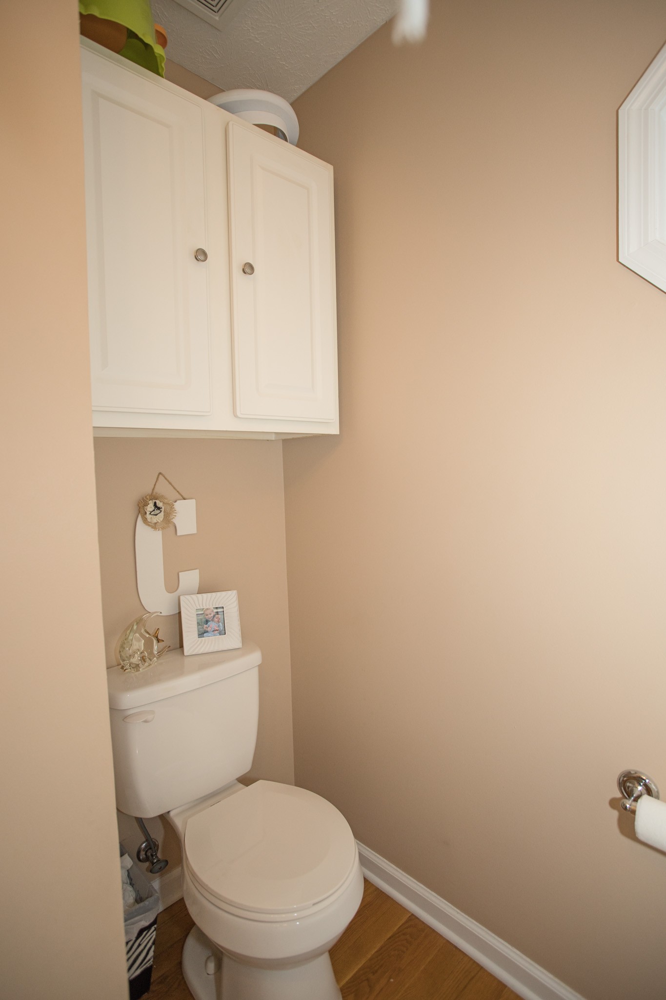 2682 Woods Road Springfield, TN 37172 - Photo 23 of 29 a white toilet sitting next to a bathroom sink
