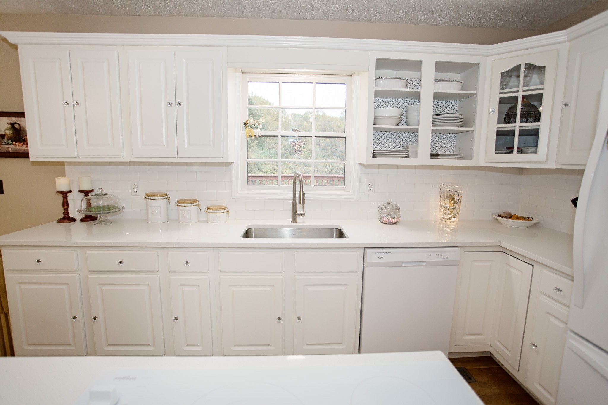 2682 Woods Road Springfield, TN 37172 - Photo 9 of 29 a kitchen with white cabinets and sink