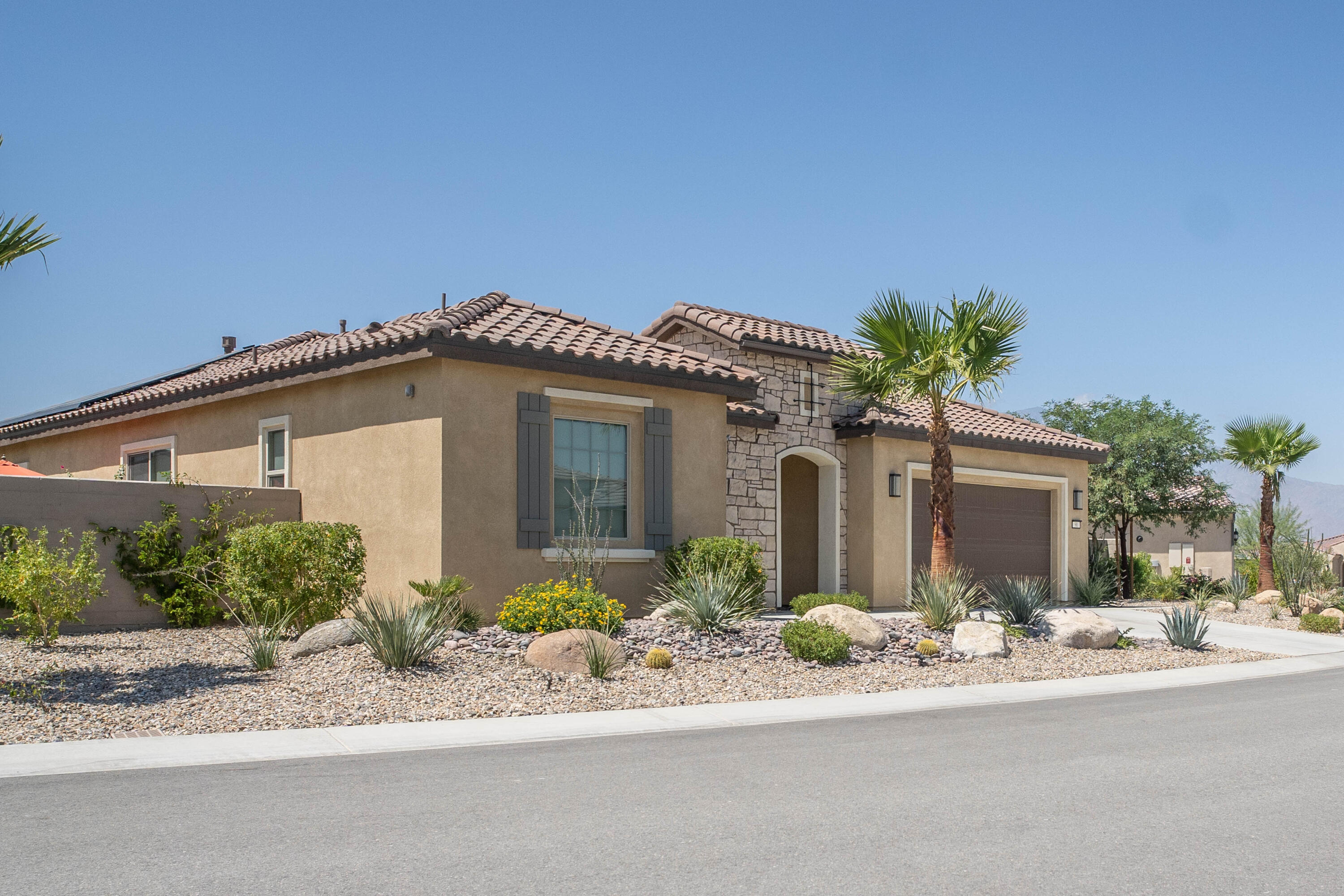 90 Cabernet Rancho Mirage, CA 92270 - Photo 13 of 83 front view of a house with a yard