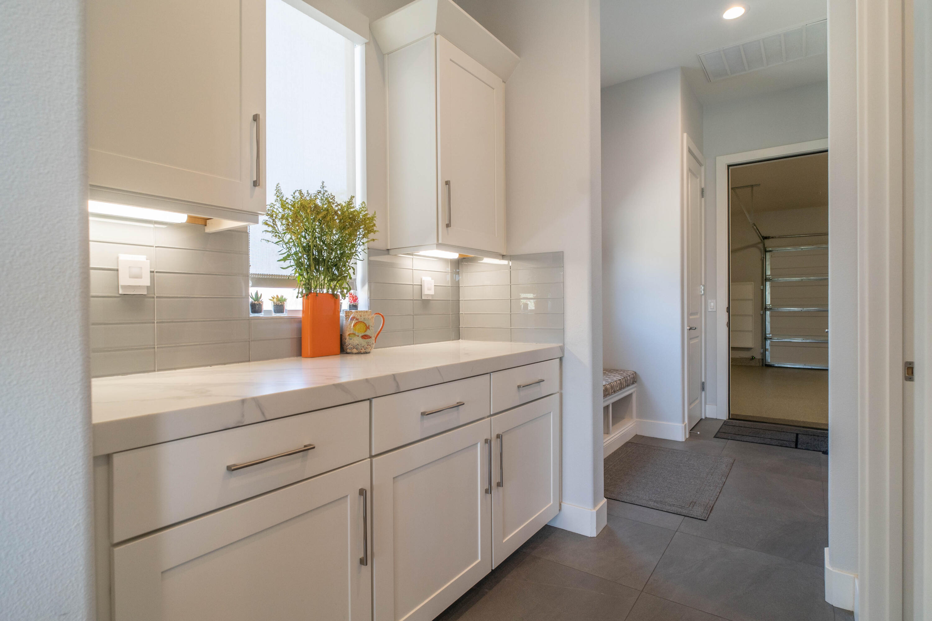 90 Cabernet Rancho Mirage, CA 92270 - Photo 25 of 83 a bathroom with a sink a mirror and a potted plant