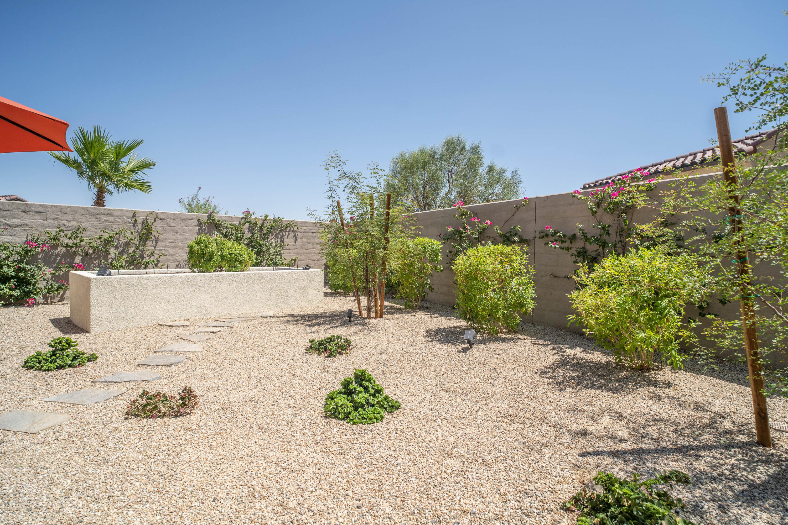 90 Cabernet Rancho Mirage, CA 92270 - Photo 55 of 83 a view of a yard with potted plants