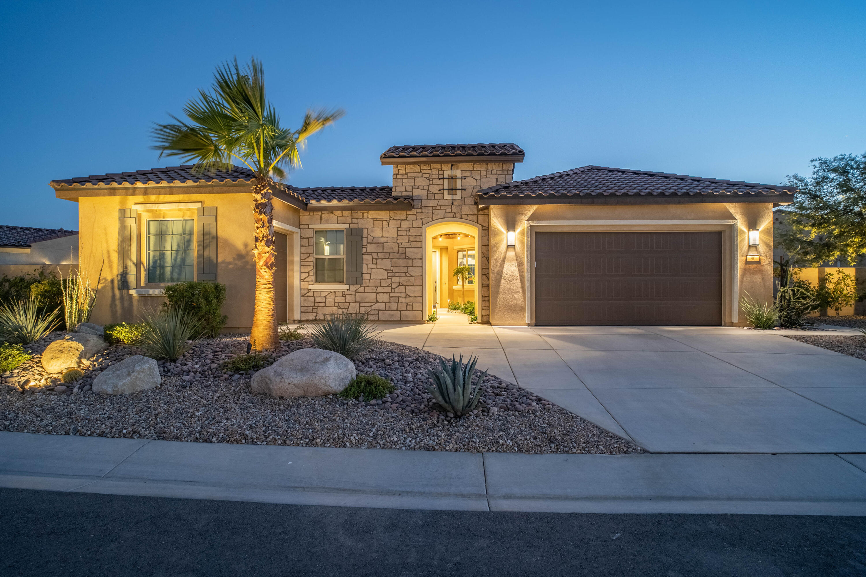 90 Cabernet Rancho Mirage, CA 92270 - Photo 9 of 83 a front view of a house with a yard