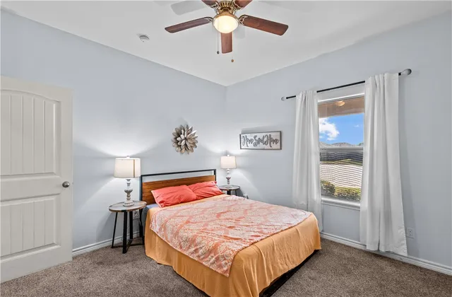 a bedroom with a bed and closet