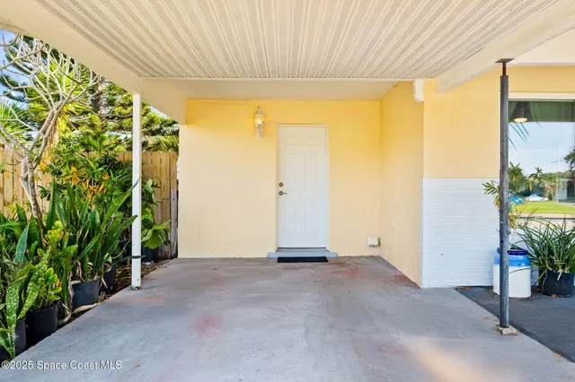a view of a room with a large window