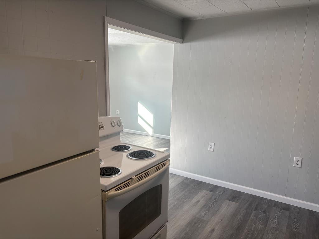 1369 Lawsonham Road, Unit 2 Rimersburg, PA 16248 - Photo 4 of 10 a view of a kitchen with stove and refrigerator