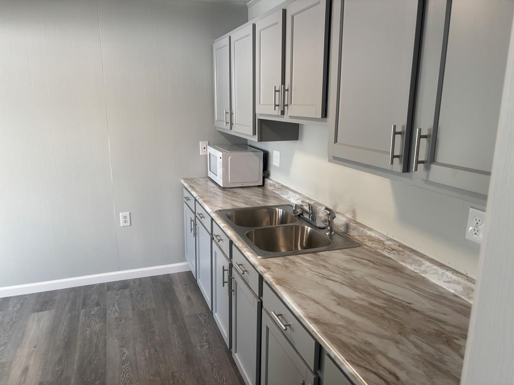 1369 Lawsonham Road, Unit 2 Rimersburg, PA 16248 - Photo 5 of 10 a kitchen with stainless steel appliances granite countertop a sink stove and cabinets