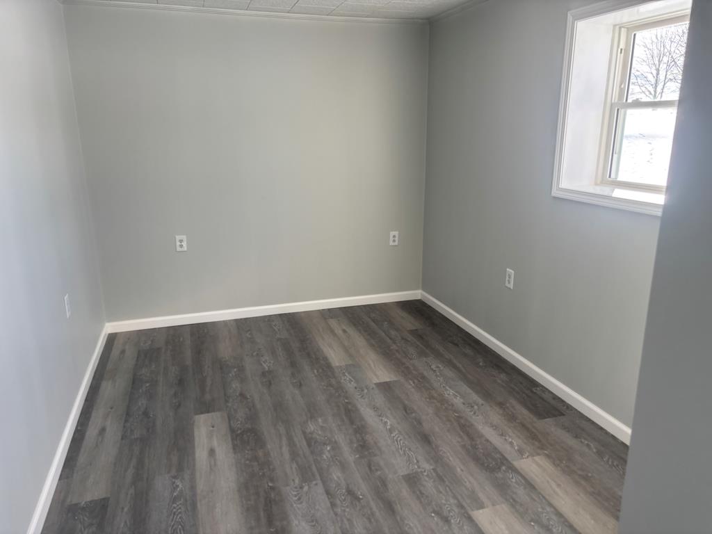 1369 Lawsonham Road, Unit 2 Rimersburg, PA 16248 - Photo 7 of 10 a view of wooden floor in an empty room