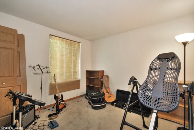 1734 Windcrest Lane Aurora, IL 60504 - Photo 9 of 10 a view of a room with gym equipment