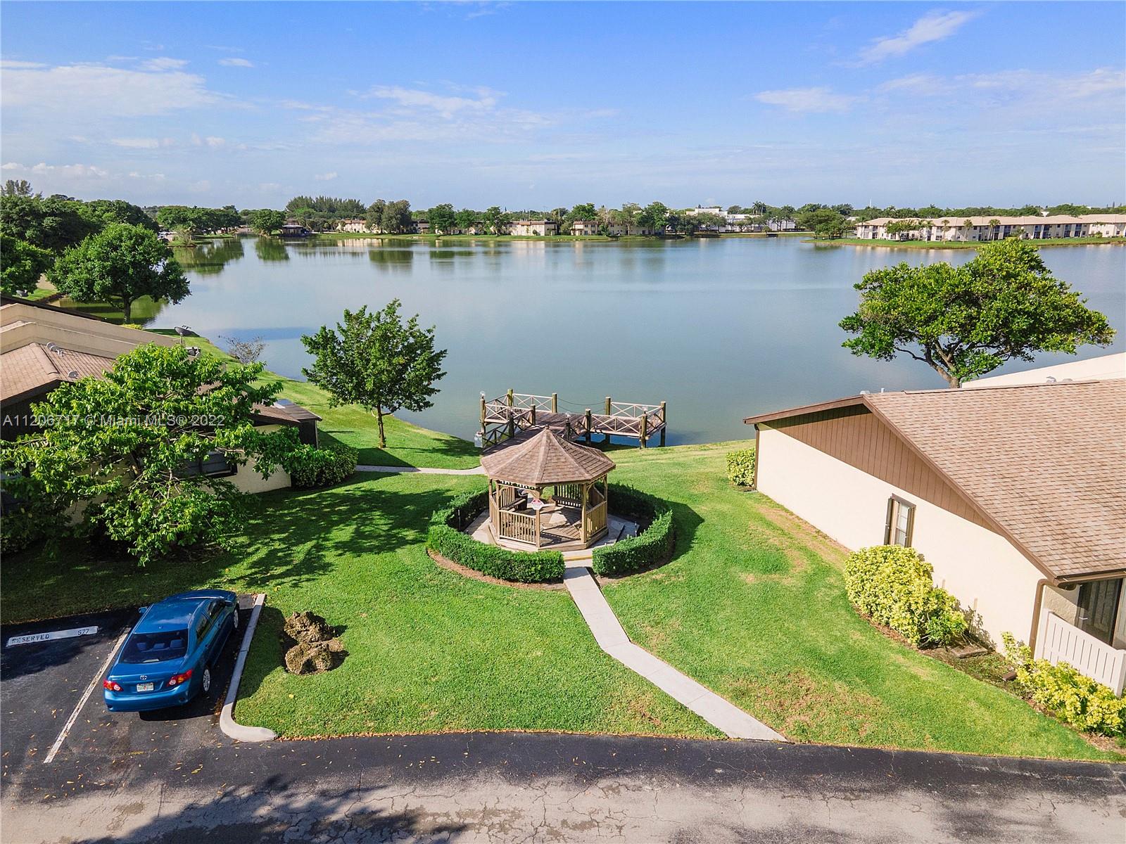 633 Banks Road, Unit 633 Margate, FL 33063 - Photo 31 of 48 an aerial view of a house with garden space and lake view