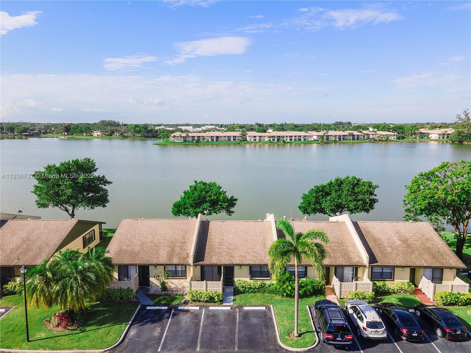 633 Banks Road, Unit 633 Margate, FL 33063 - Photo 4 of 48 an aerial view of a house with garden space and lake view