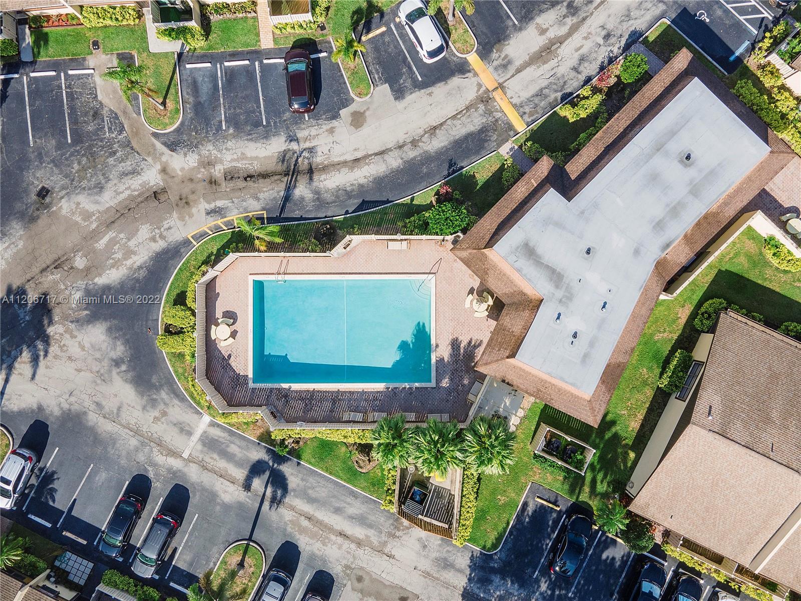 633 Banks Road, Unit 633 Margate, FL 33063 - Photo 42 of 48 an aerial view of a house with a swimming pool