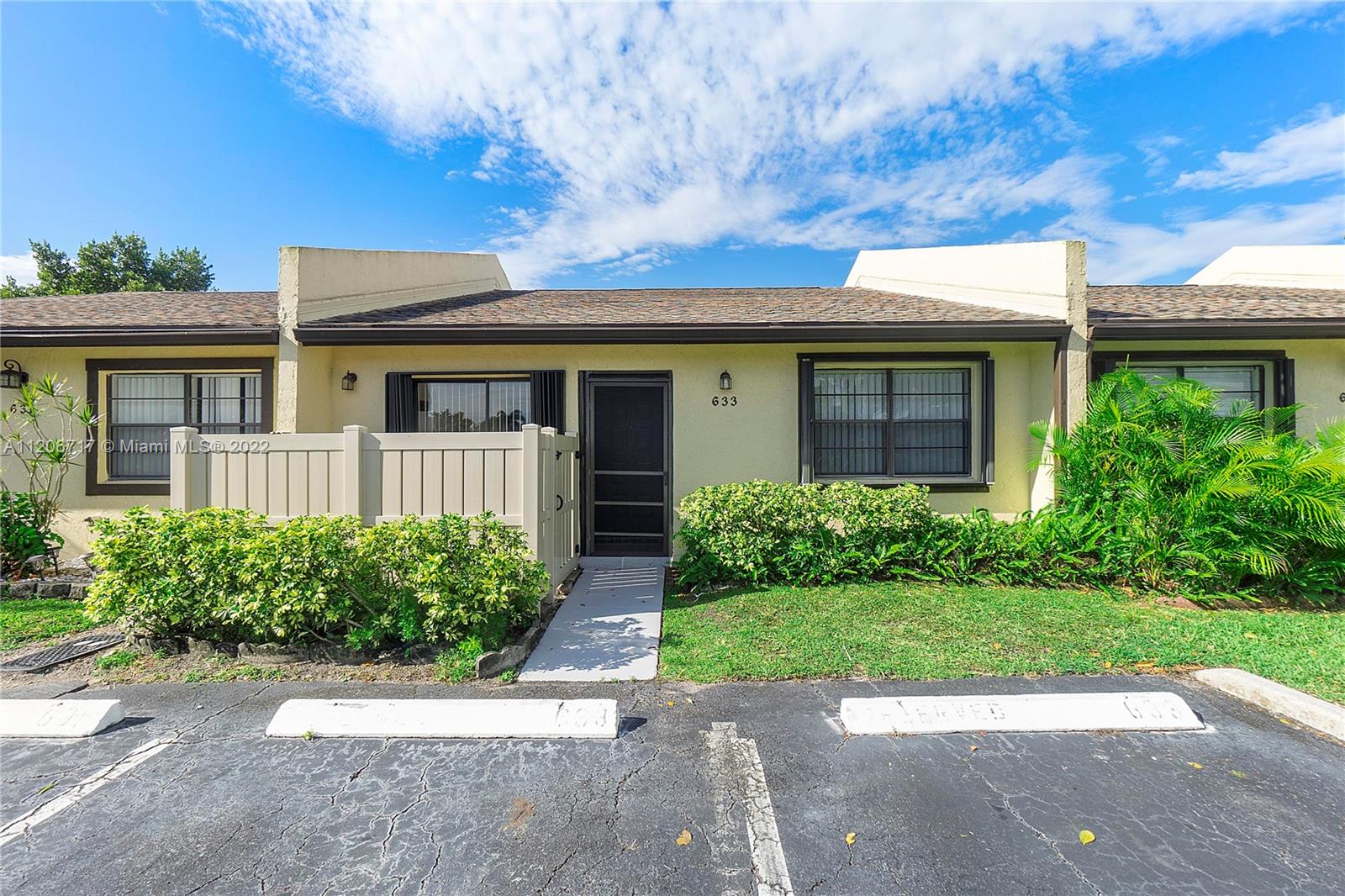 633 Banks Road, Unit 633 Margate, FL 33063 - Photo 44 of 48 front view of a house with a yard