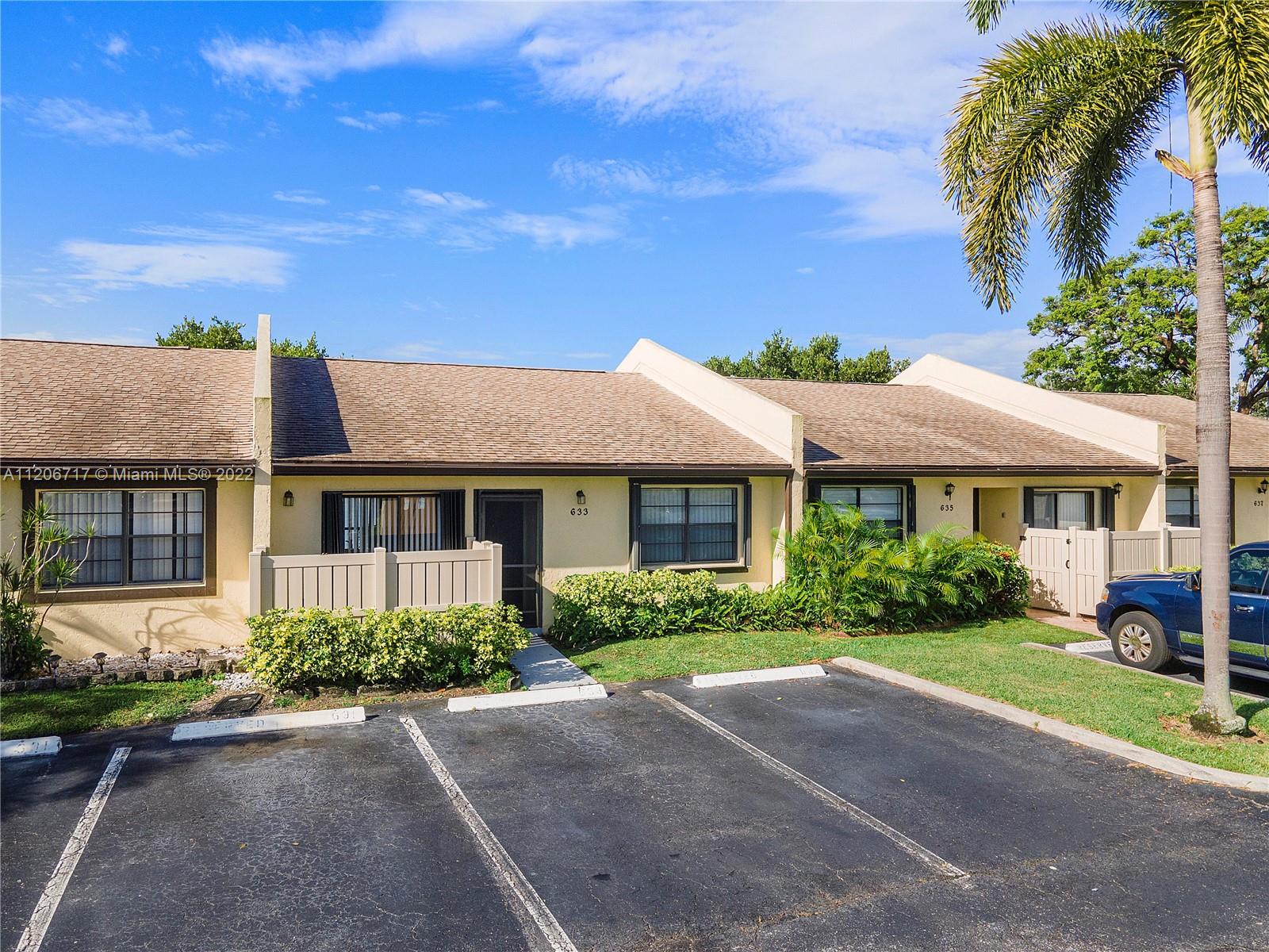 633 Banks Road, Unit 633 Margate, FL 33063 - Photo 6 of 48 front view of a house with a yard