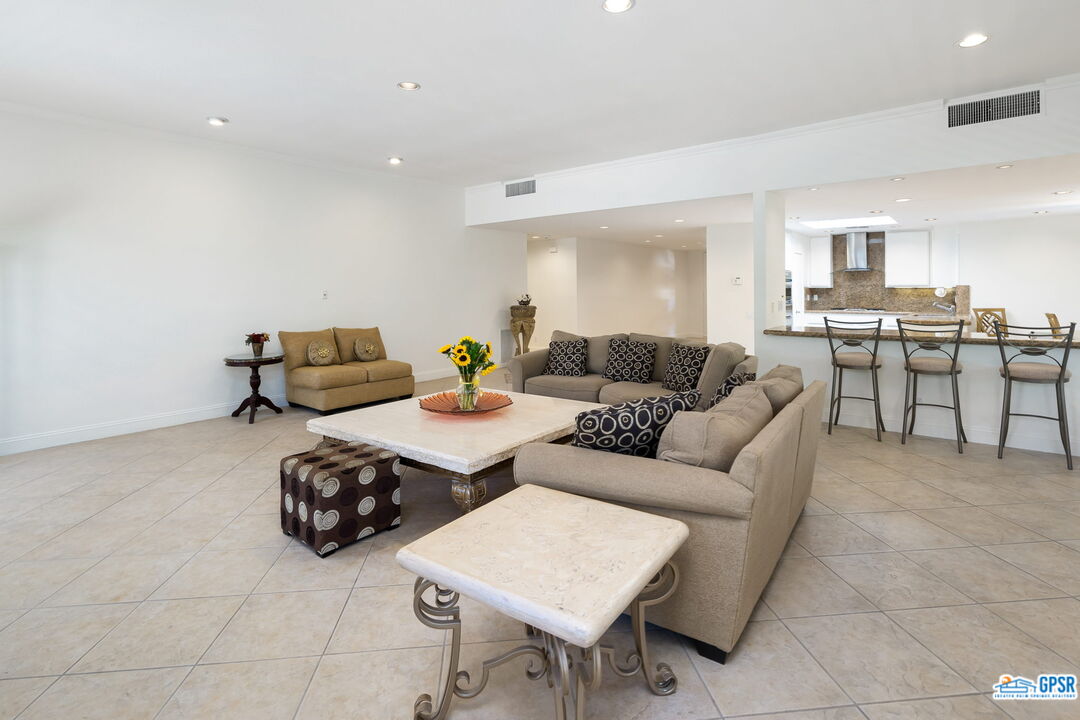 75 Colgate Drive Rancho Mirage, CA 92270 - Photo 16 of 52 a living room with furniture and view of kitchen