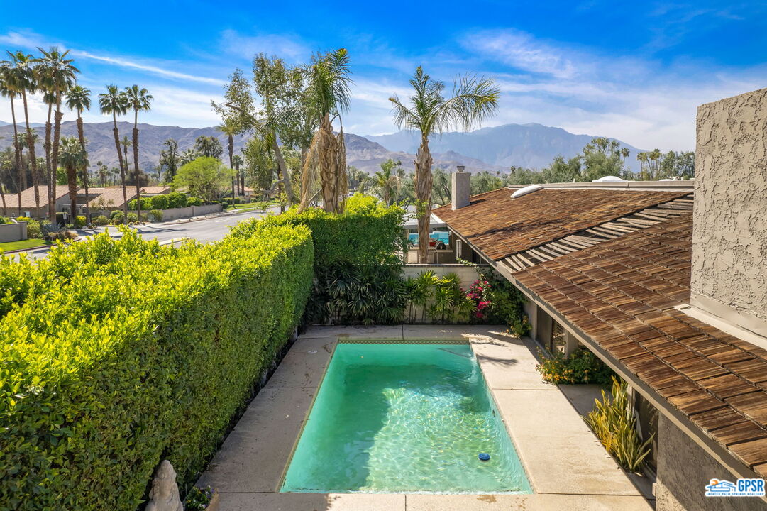 75 Colgate Drive Rancho Mirage, CA 92270 - Photo 3 of 52 a view of a backyard with a garden