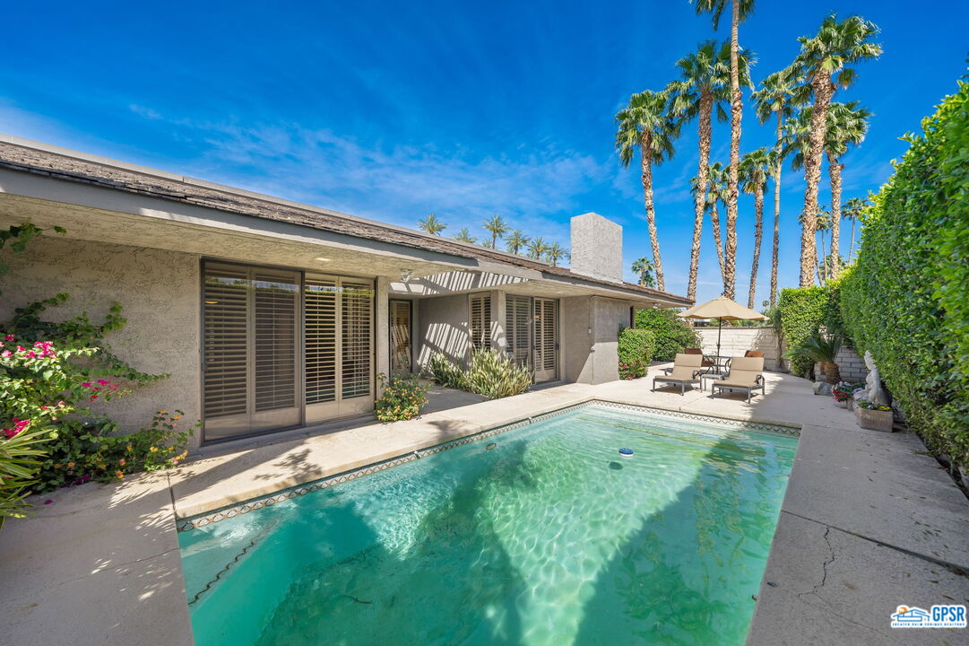75 Colgate Drive Rancho Mirage, CA 92270 - Photo 32 of 52 a view of a house with backyard and garden