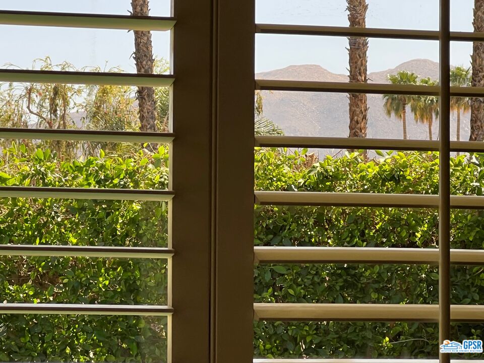 75 Colgate Drive Rancho Mirage, CA 92270 - Photo 49 of 52 a view of a glass building from a window