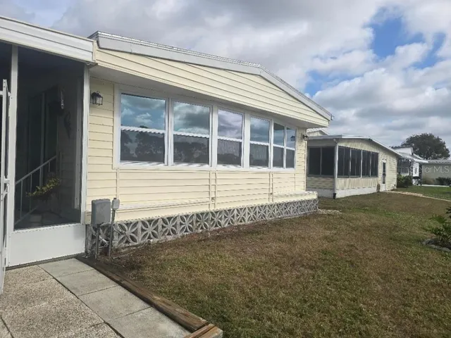 a large bathroom with a double vanity sink and a mirror