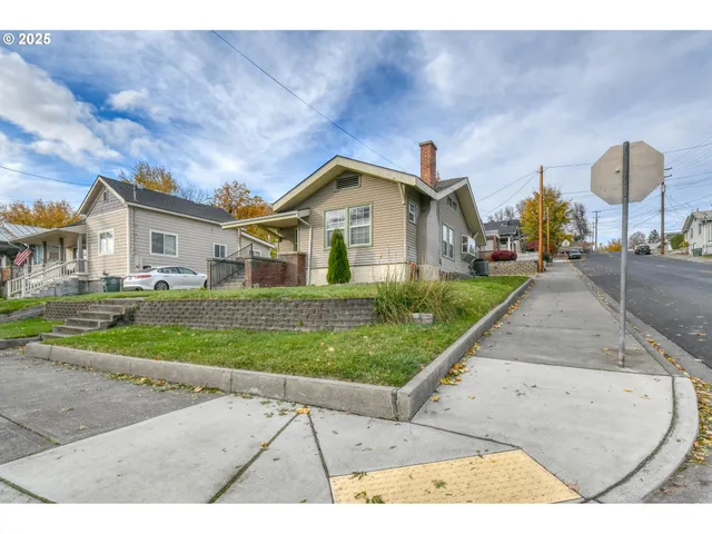 a house view with a garden space