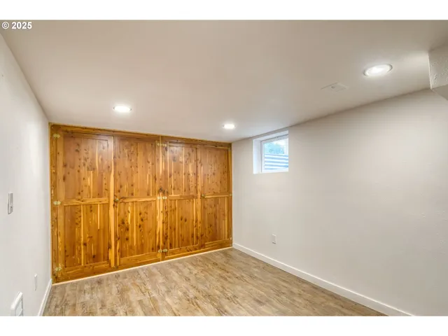 a view of a house with backyard porch and furniture