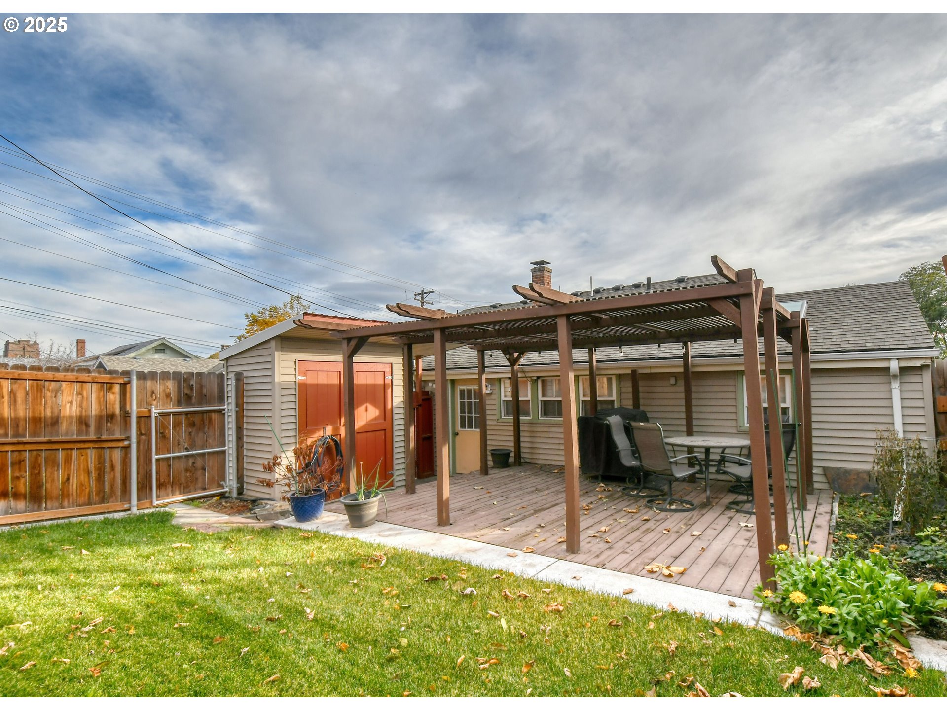 1003 Northwest Carden Avenue Pendleton, OR 97801 - Photo 43 of 48 a view of a house with backyard porch and furniture