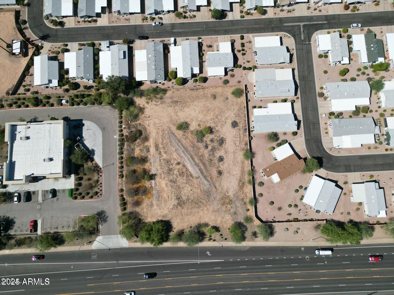 an aerial view of a building with street