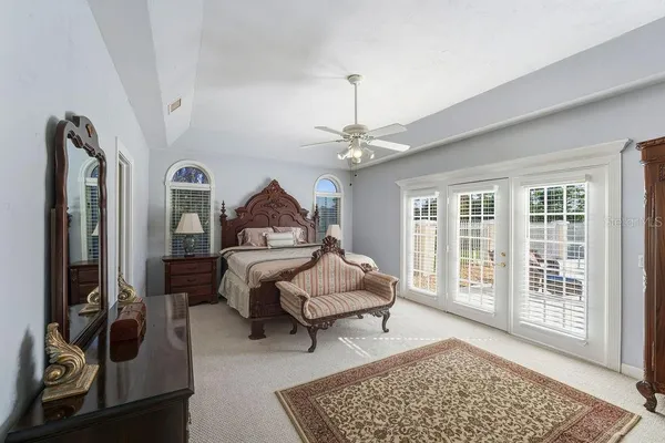 a view of hallway with wooden floor