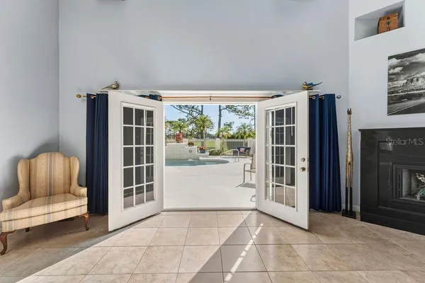 an aerial view of a house with a yard table and chairs