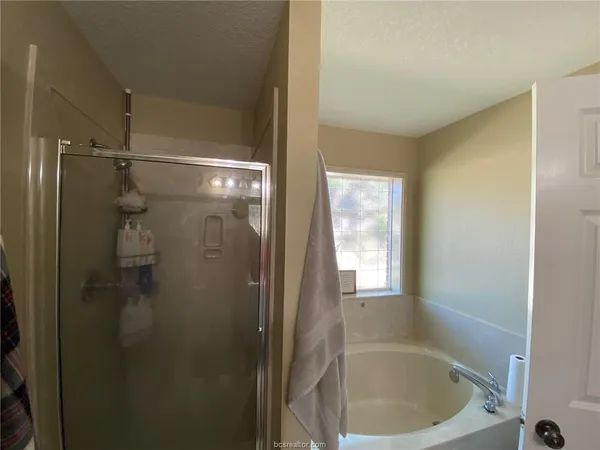 a bathroom with a bathtub