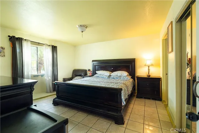 a kitchen with a sink and refrigerator