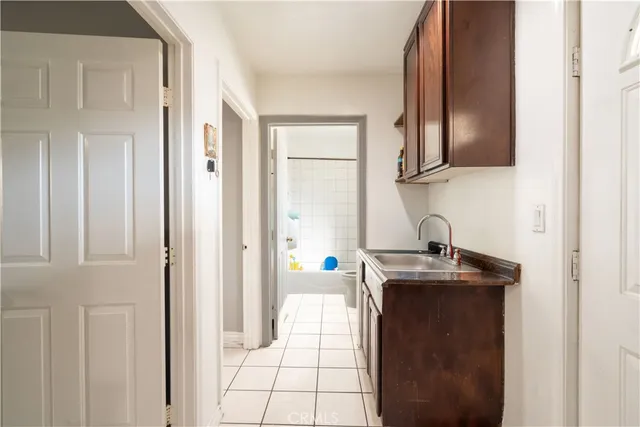 a bathroom with a toilet a sink and a bathtub