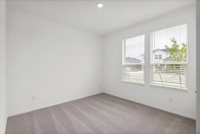 a kitchen with sink and window