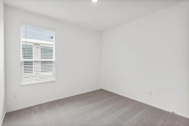 a view of storage and utility room with washer and dryer