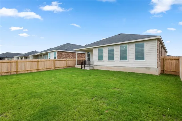 a view of a backyard with a garden