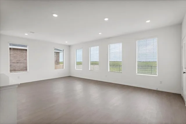 an empty room with windows