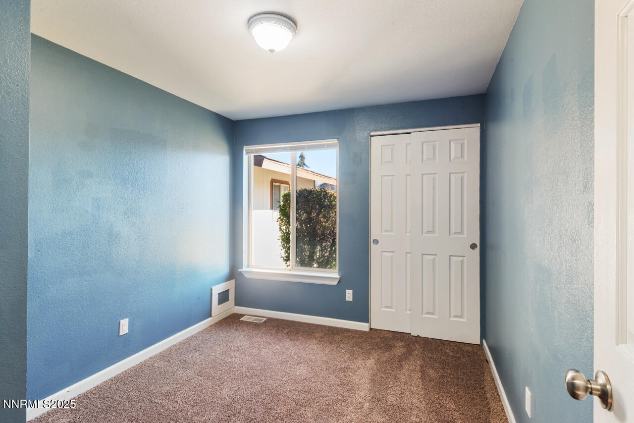 3560 Haystack Drive Carson City, NV 89705 - Photo 16 of 23 an empty room with windows and closet