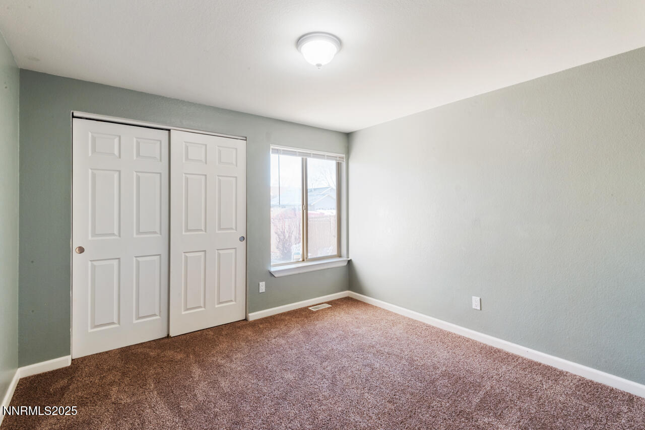 3560 Haystack Drive Carson City, NV 89705 - Photo 18 of 23 an empty room with windows