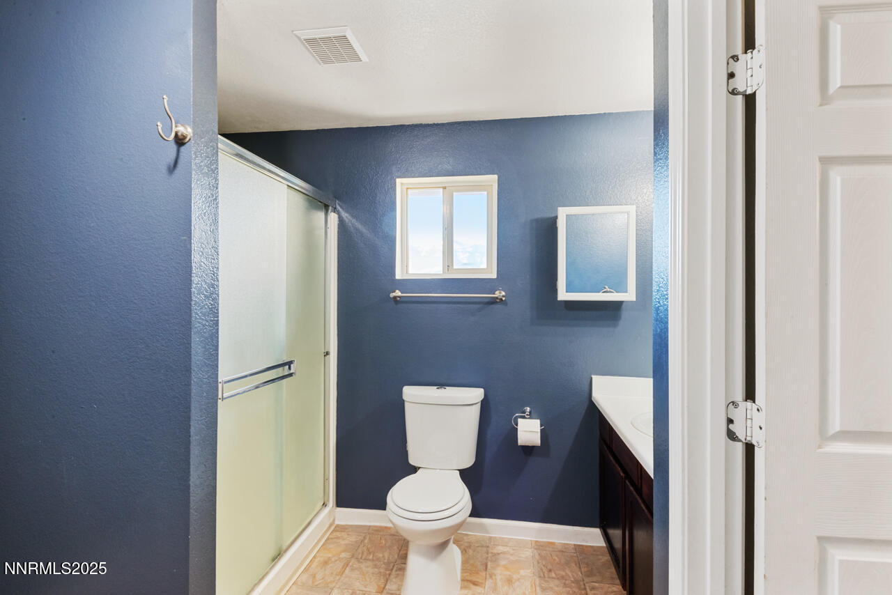 3560 Haystack Drive Carson City, NV 89705 - Photo 20 of 23 a bathroom with a toilet and a sink