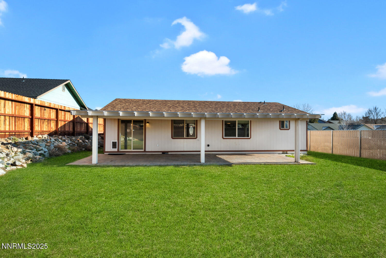3560 Haystack Drive Carson City, NV 89705 - Photo 6 of 23 a view of a house with a backyard