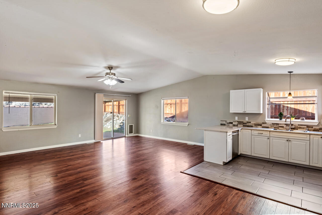3560 Haystack Drive Carson City, NV 89705 - Photo 9 of 23 a view of a kitchen with stove and wooden floor