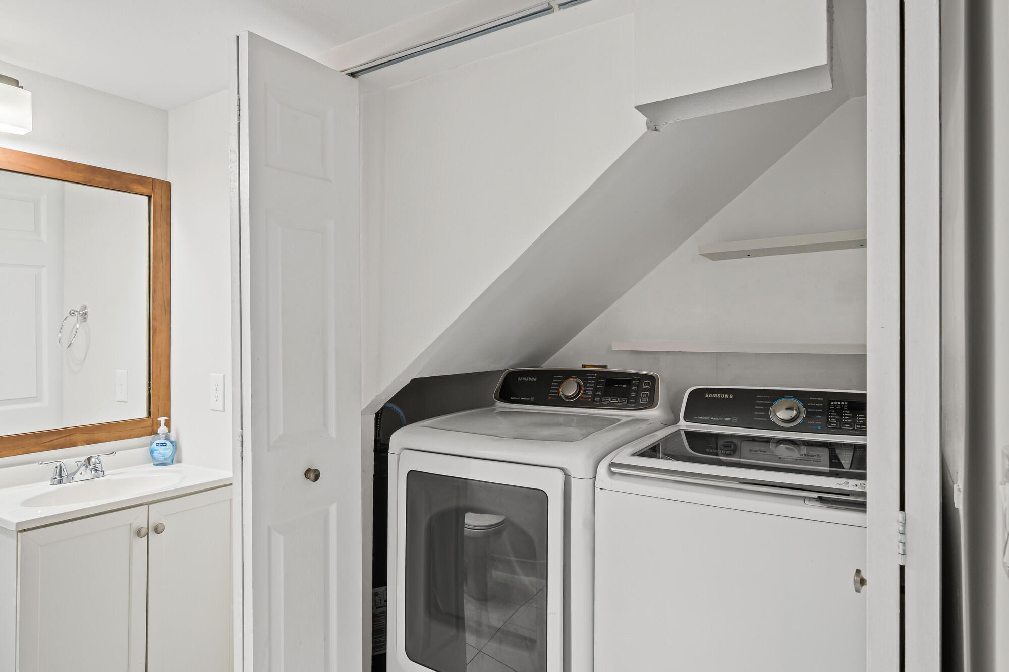 8194 Thames Boulevard, Unit B Boca Raton, FL 33433 - Photo 14 of 49 a utility room with dryer and washer