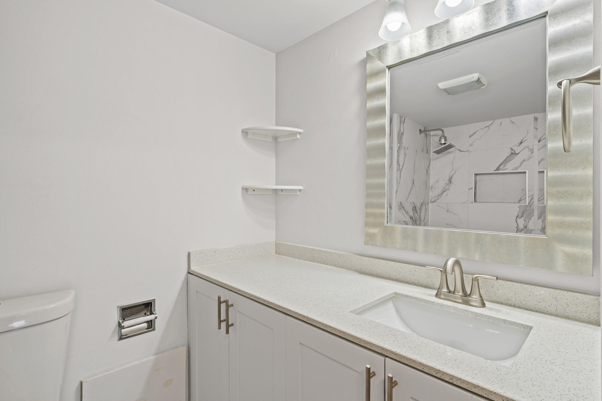 8194 Thames Boulevard, Unit B Boca Raton, FL 33433 - Photo 25 of 49 a bathroom with a sink and a mirror